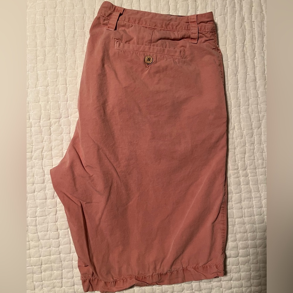Salmon colored flat front short